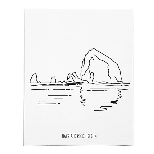 An art print featuring a line drawing of Haystack Rock on white linen paper