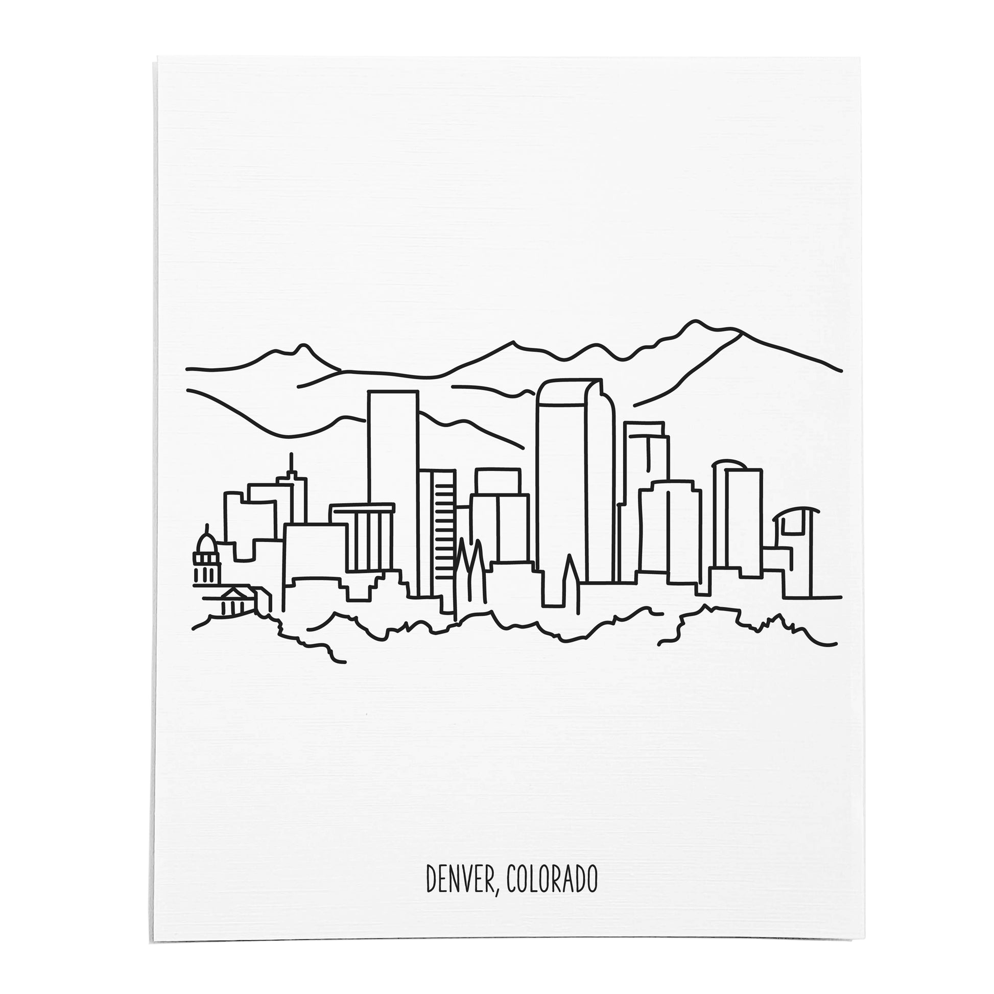An art print featuring a line drawing of the Denver Skyline on white linen paper