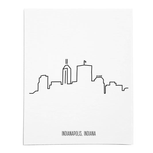 An art print featuring a line drawing of the Indianapolis Skyline on white linen paper