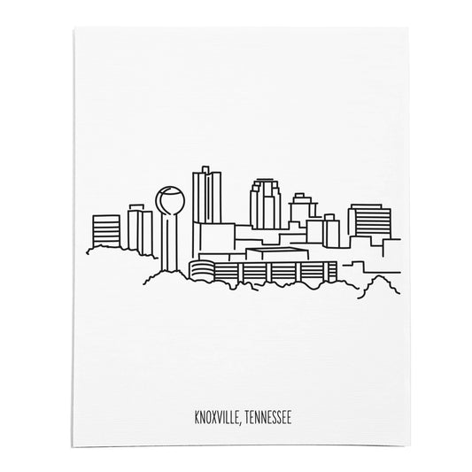 An art print featuring a line drawing of the Knoxville Skyline on white linen paper