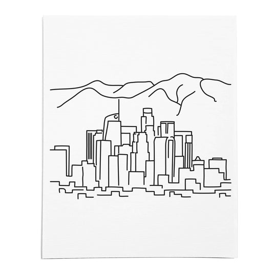 An art print featuring a line drawing of the Los Angeles Skyline on white linen paper