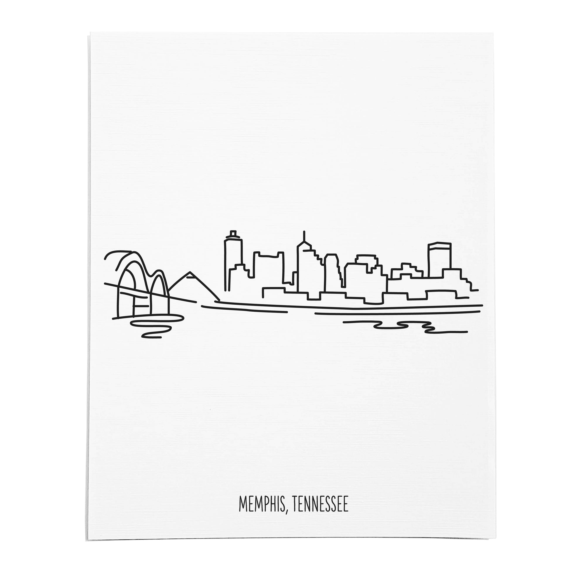 An art print featuring a line drawing of the Memphis Skyline on white linen paper