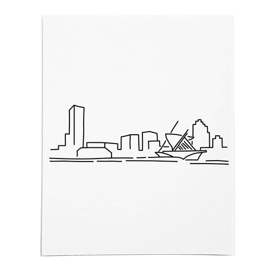 An art print featuring a line drawing of the Milwaukee Skyline on white linen paper