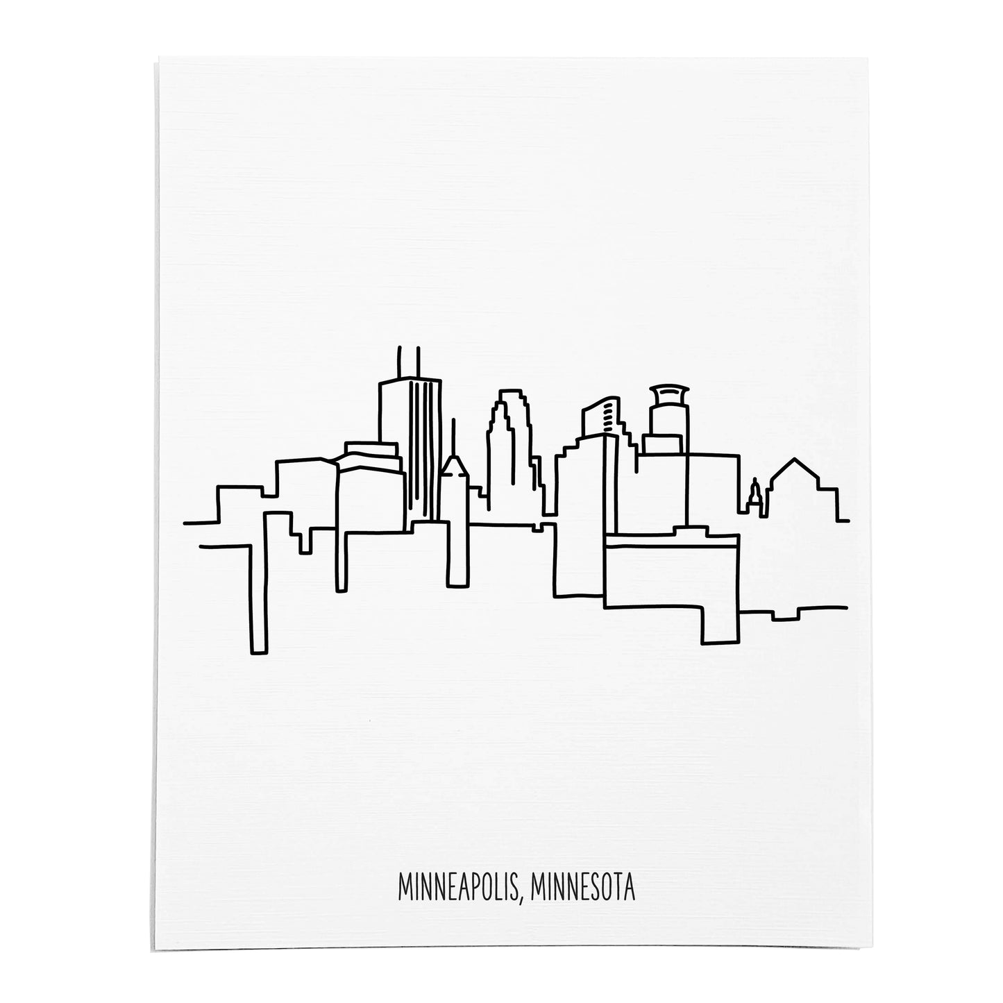 An art print featuring a line drawing of the Minneapolis Skyline on white linen paper