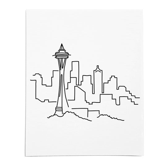 An art print featuring a line drawing of the Seattle Skyline on white linen paper