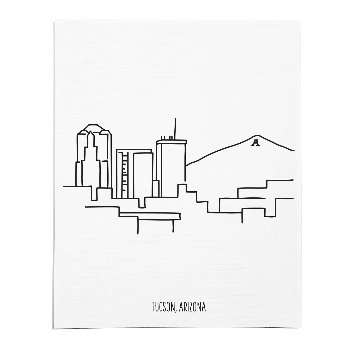 An art print featuring a line drawing of the Tucson Skyline on white linen paper