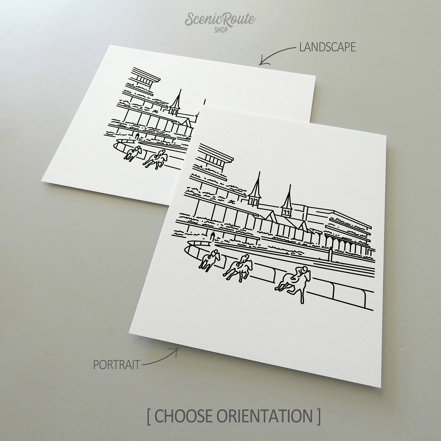Two line art drawings of Churchill Downs on white linen paper with a gray background.  The pieces are shown in portrait and landscape orientation for the available art print options.