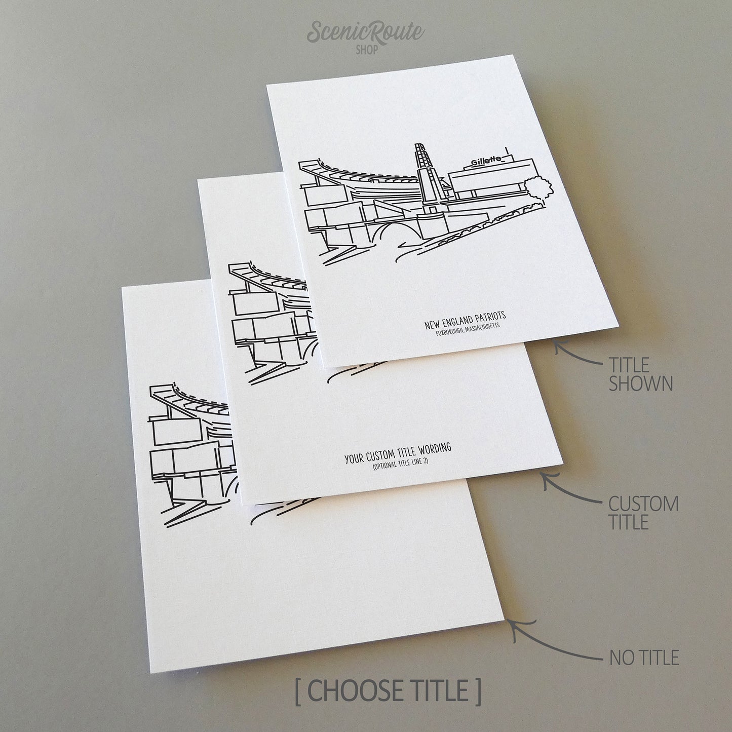 Three line art drawings of the New England Patriots Stadium on white linen paper with a gray background.  The pieces are shown with title options that can be chosen and personalized.