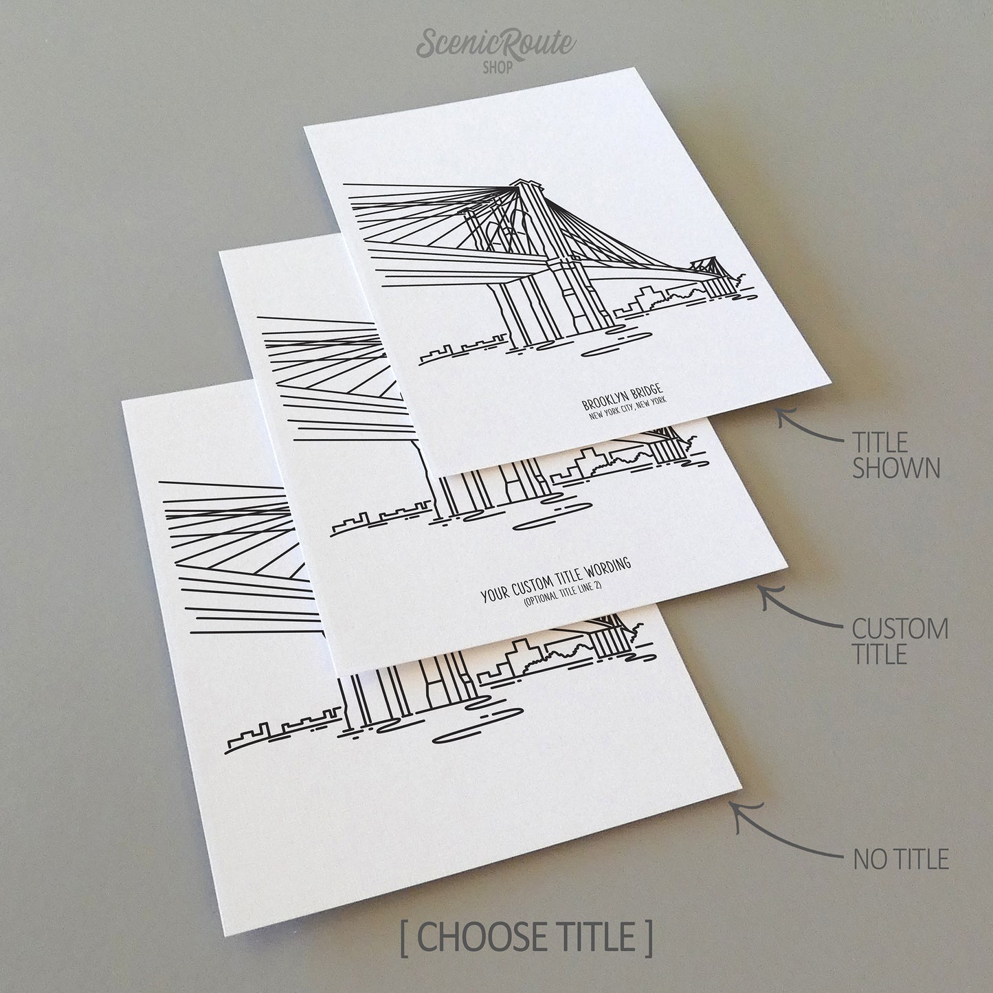 Three line art drawings of the New York City Brooklyn Bridge on white linen paper with a gray background.  The pieces are shown with title options that can be chosen and personalized.