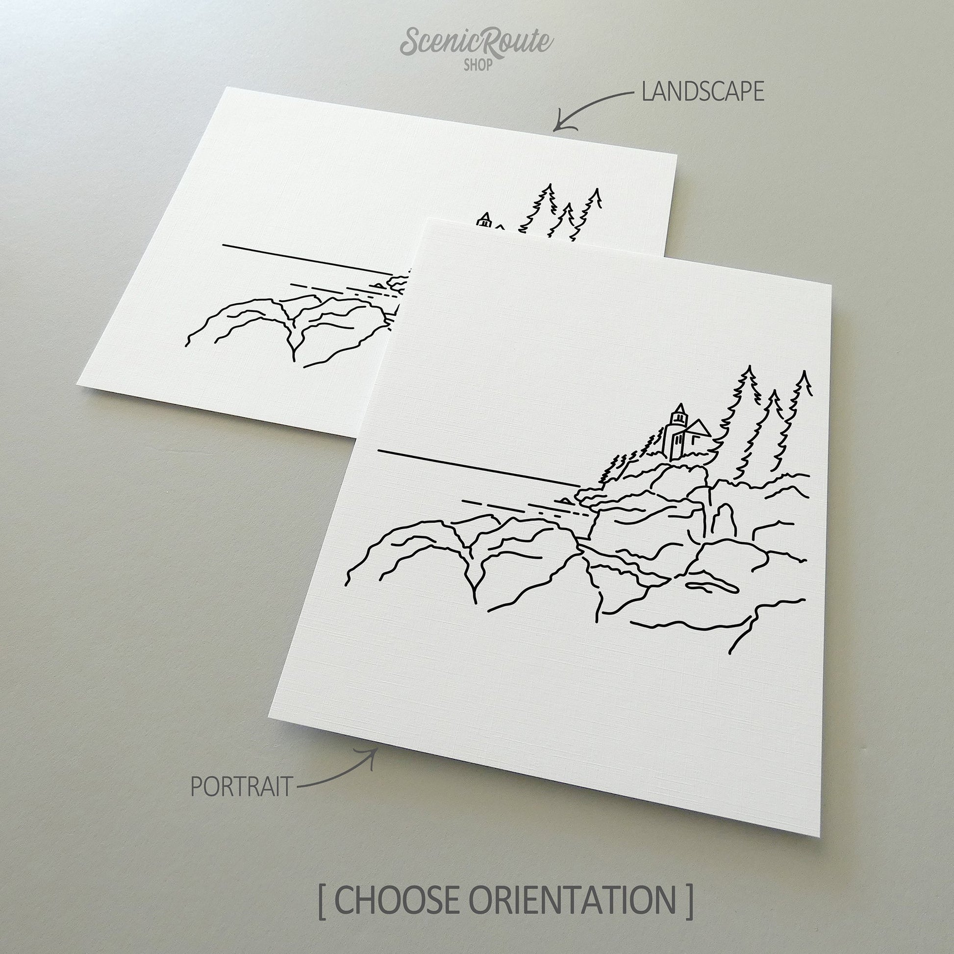 Two line art drawings of Acadia National Park on white linen paper with a gray background.  The pieces are shown in portrait and landscape orientation for the available art print options.