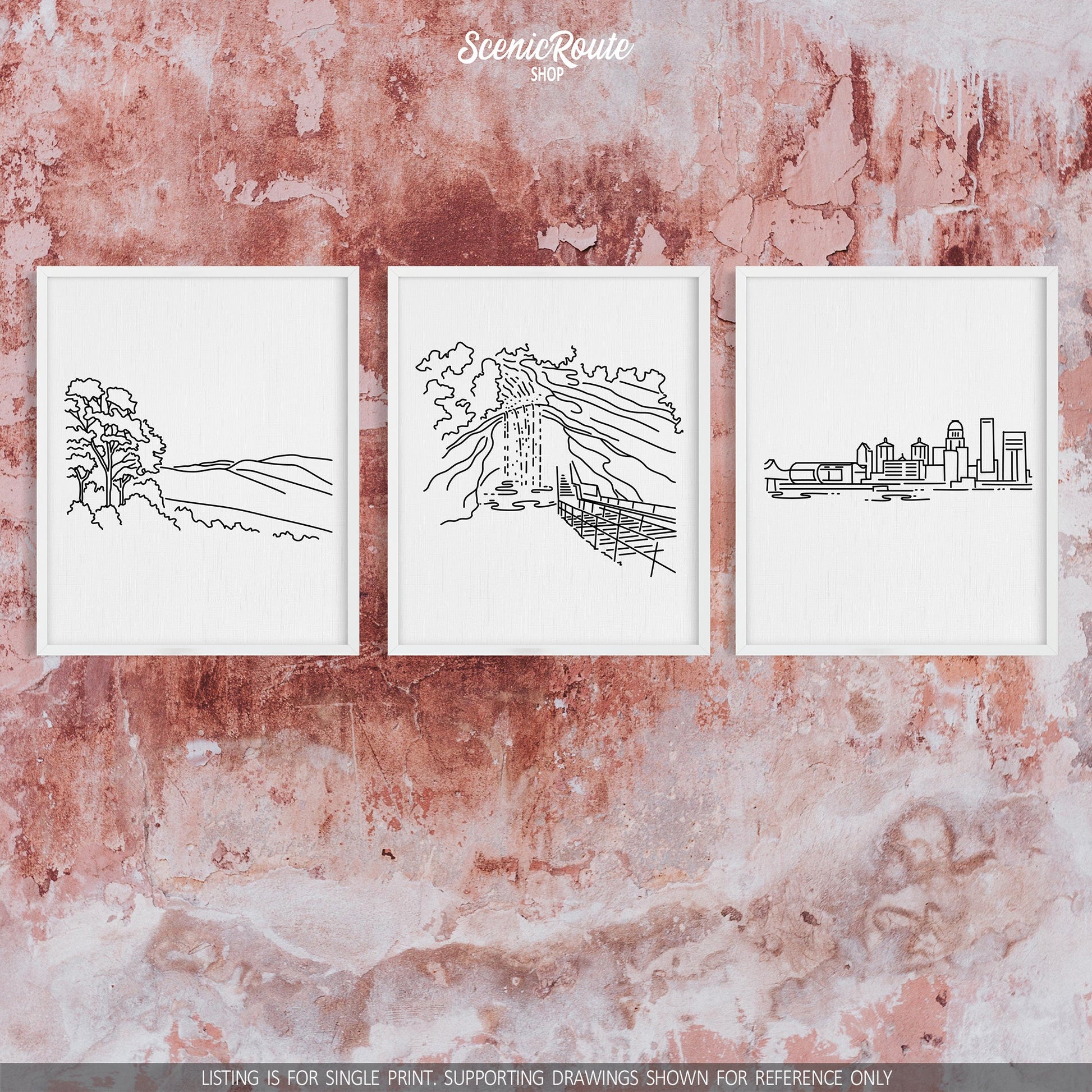 A group of three framed drawings on a concrete wall. The line art drawings include Shenandoah National Park, Mammoth Cave National Park, and the Louisville Skyline