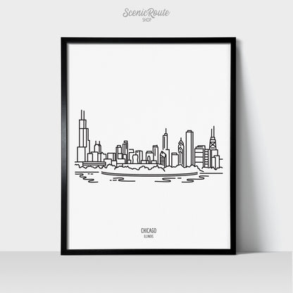 A line art drawing of the Chicago Illinois Skyline on white linen paper in a thin black picture frame